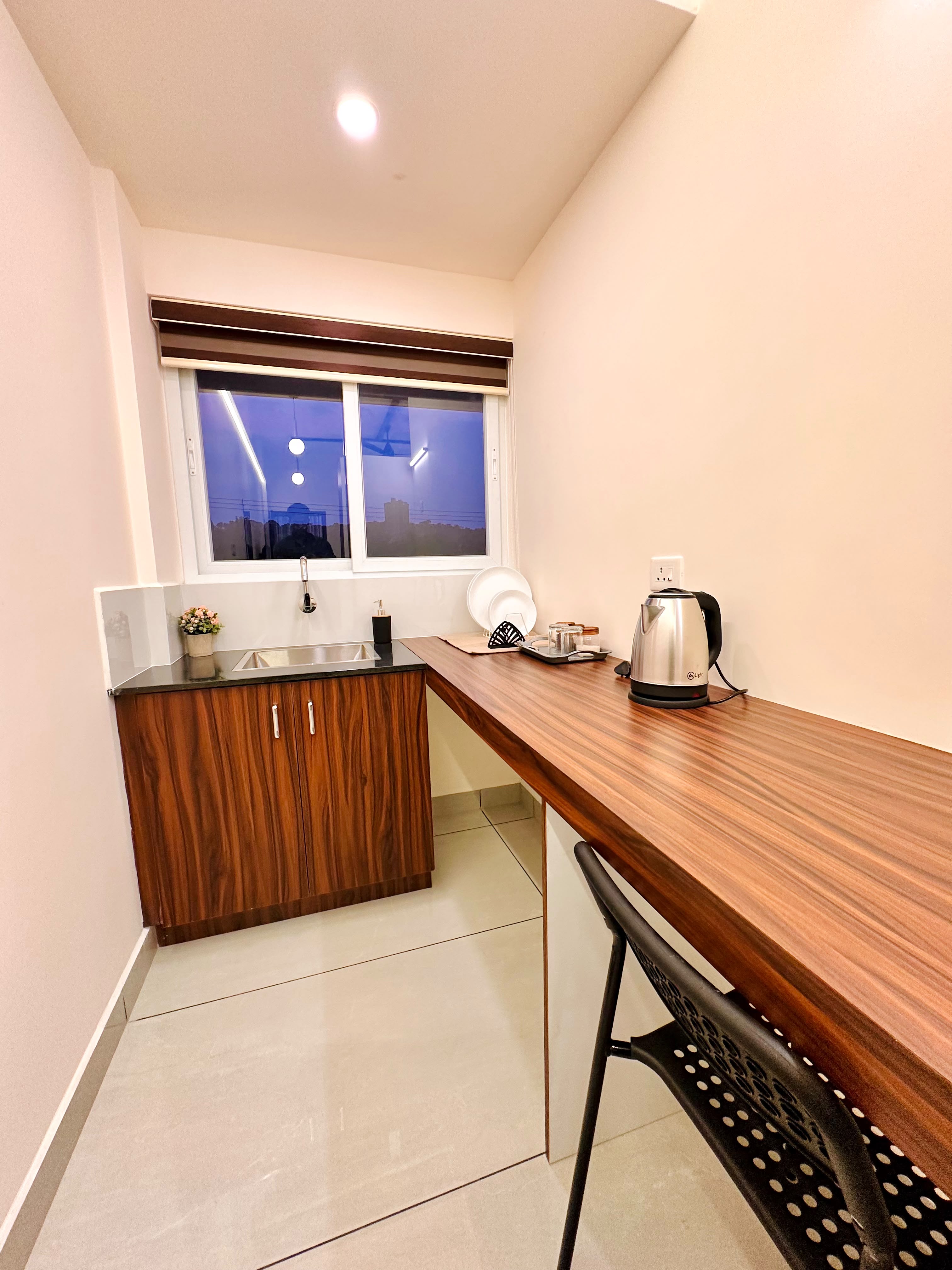 Kitchenette and work counter at Global Residency